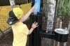 Kids refilling reusable bottles at the refill station