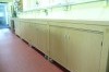 Perimeter workbenches with perimeter cupboards under the worktop