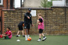 Coach Kez leading a session at Torriano Primary School, Camden